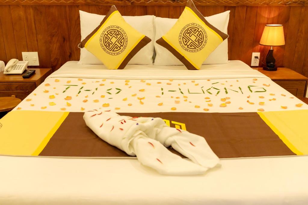 Giường trong phòng chung tại Thọ Hướng Hotel - Phan Thiết