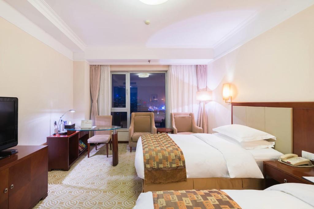 TV a/nebo společenská místnost v ubytování Inner Mongolia Grand Hotel