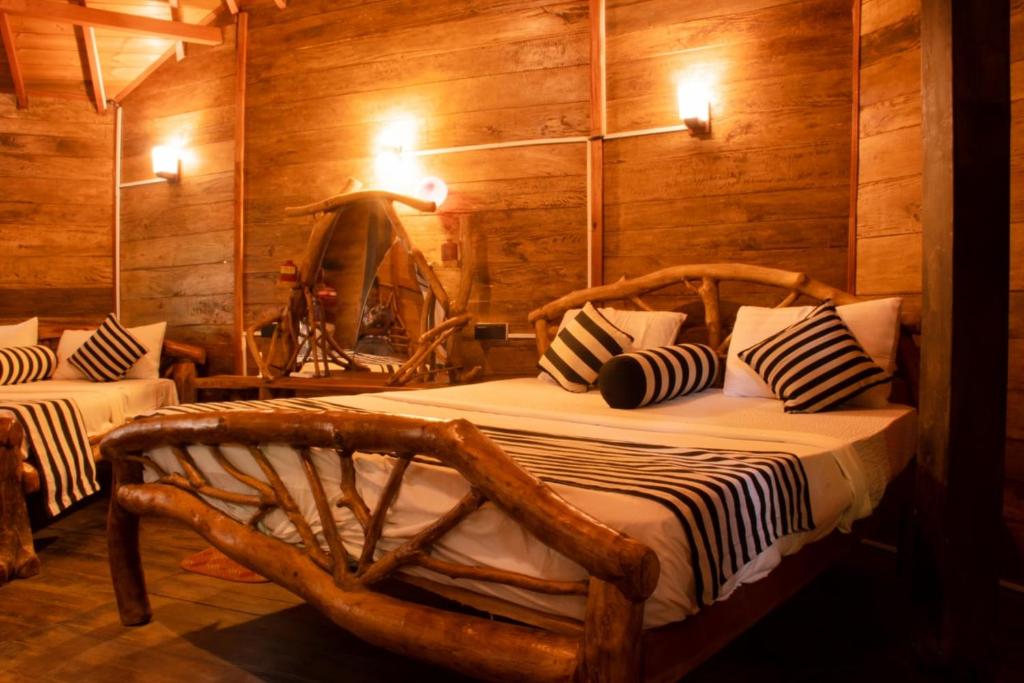 Postel nebo postele na pokoji v ubytování Dudley Nature Resort