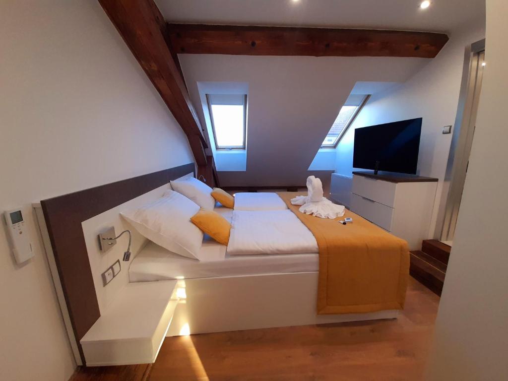 TV a/nebo společenská místnost v ubytování Residence Mariánská
