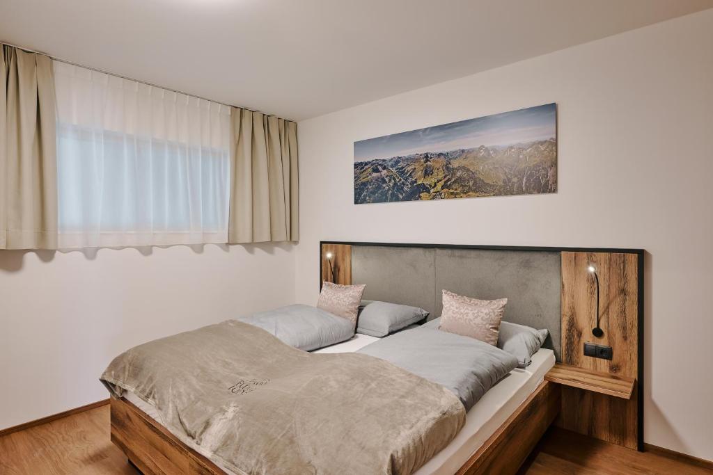 Postel nebo postele na pokoji v ubytování 1400 FlexenLodge