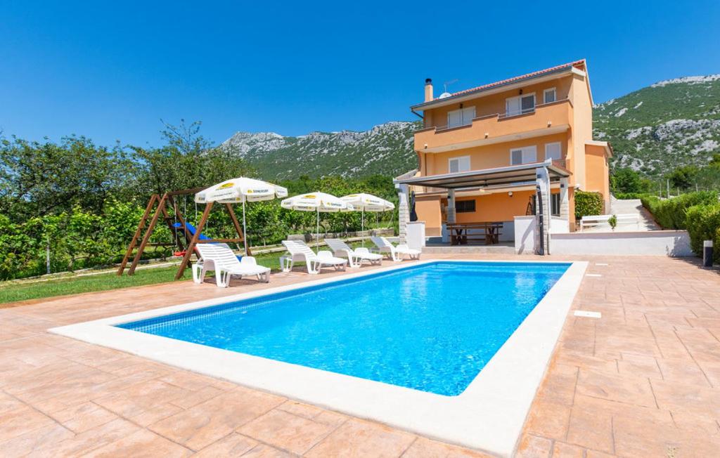 Apartment ALFI, Omiš - Ostrvica - Housity