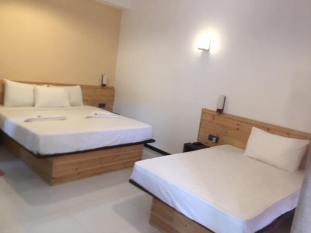 Postel nebo postele na pokoji v ubytování Hotel Bella Vista