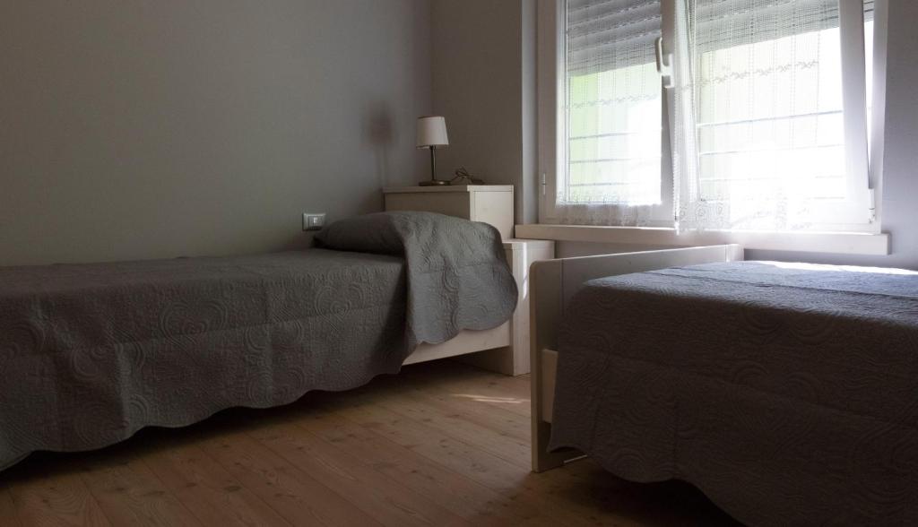 Posteľ alebo postele v izbe v ubytovaní Albergo Diffuso
