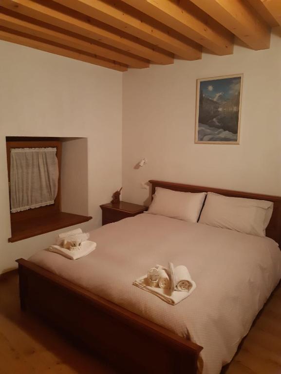 Posteľ alebo postele v izbe v ubytovaní Albergo Diffuso