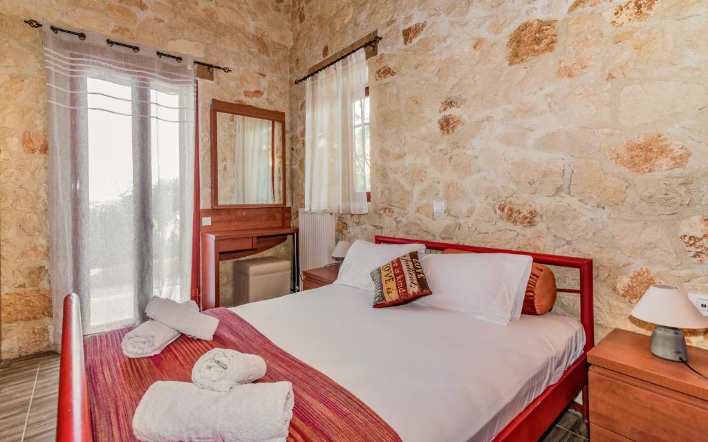 Postel nebo postele na pokoji v ubytování Casa Petra - Stone Cottage Farmhouses