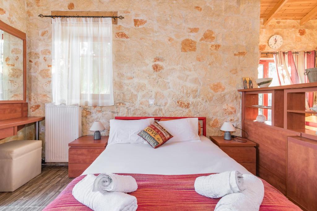 Postel nebo postele na pokoji v ubytování Casa Petra - Stone Cottage Farmhouses