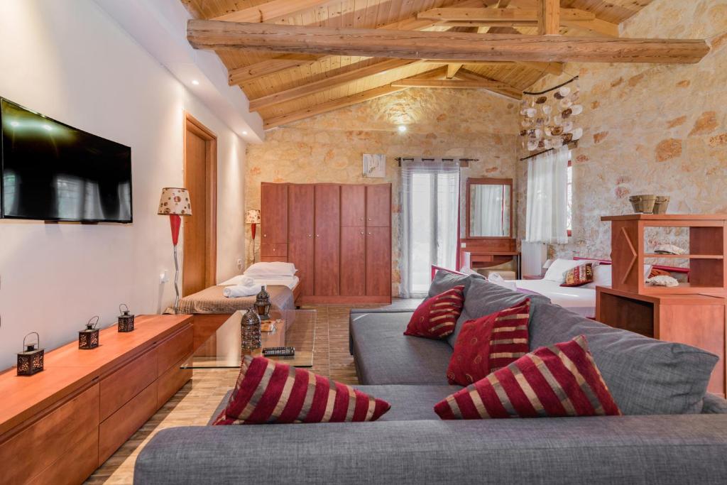 TV a/nebo společenská místnost v ubytování Casa Petra - Stone Cottage Farmhouses