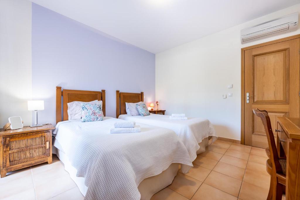 Postel nebo postele na pokoji v ubytování Praia da Luz Monique Apartment