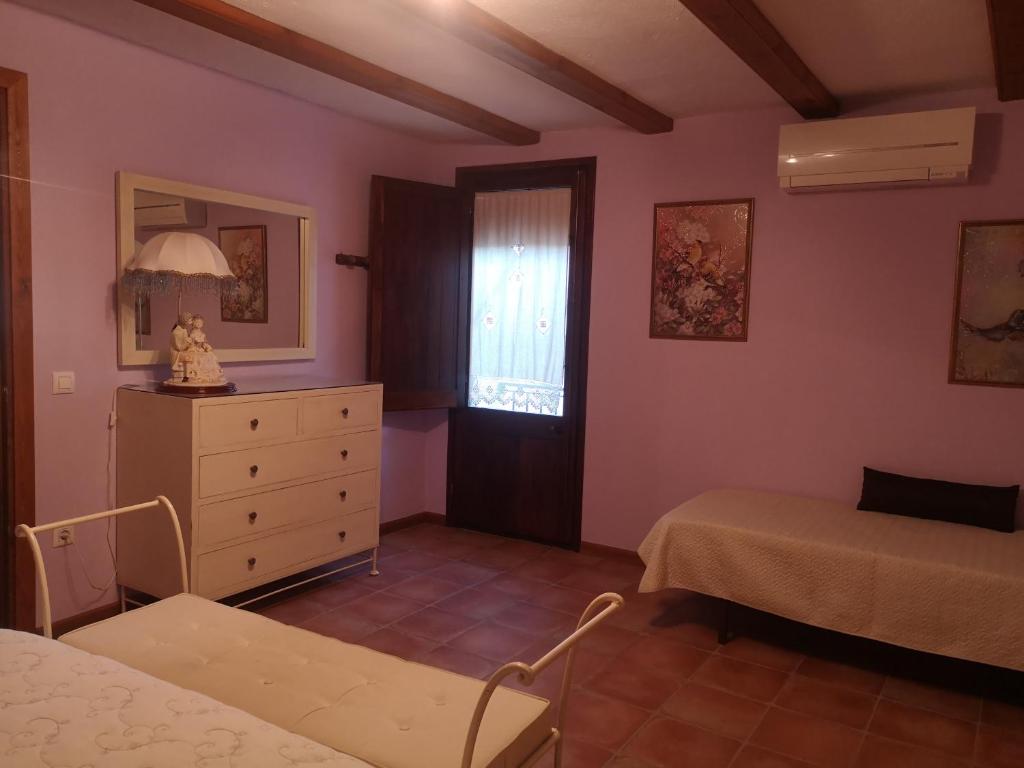 Posteľ alebo postele v izbe v ubytovaní Casa rural, masia antigua restaurada