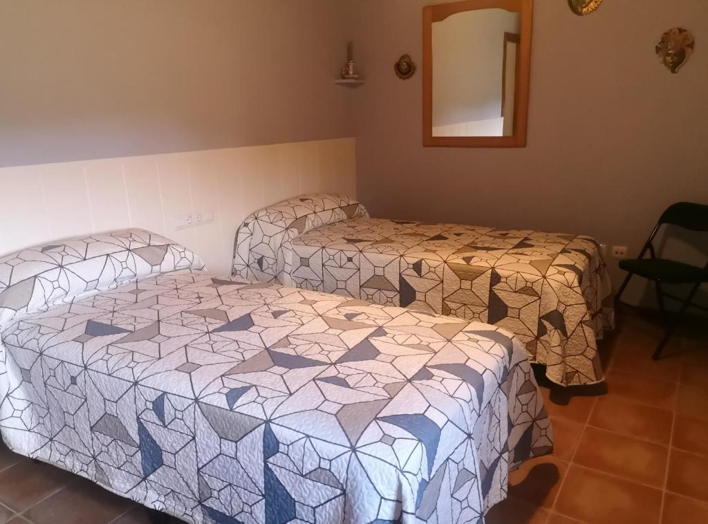 Posteľ alebo postele v izbe v ubytovaní Casa rural, masia antigua restaurada