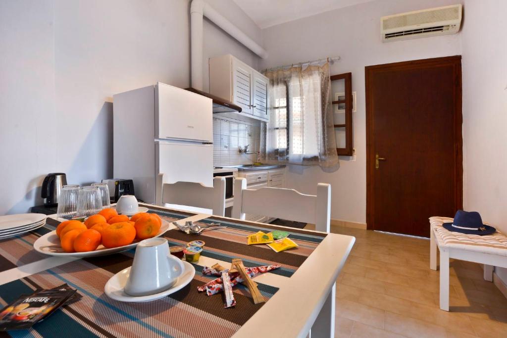 A kitchen or kitchenette at Kerkyra Apartments