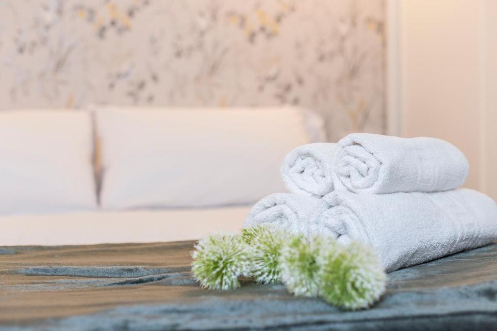 Posteľ alebo postele v izbe v ubytovaní LaLa Suites Corredera Centro
