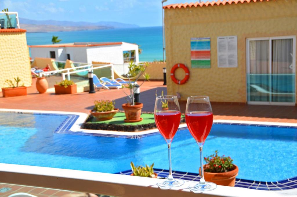 The swimming pool at or close to Ferienwohnung PLAYA - Pool - 50 m Strand - Meerblick - WiFi