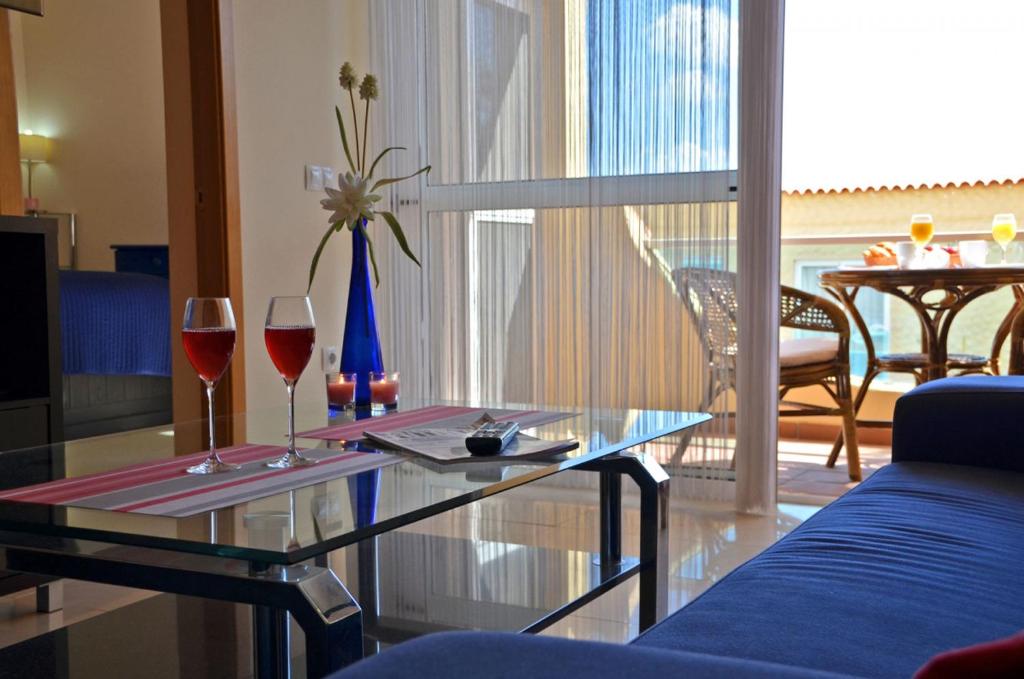 A seating area at Ferienwohnung PLAYA - Pool - 50 m Strand - Meerblick - WiFi