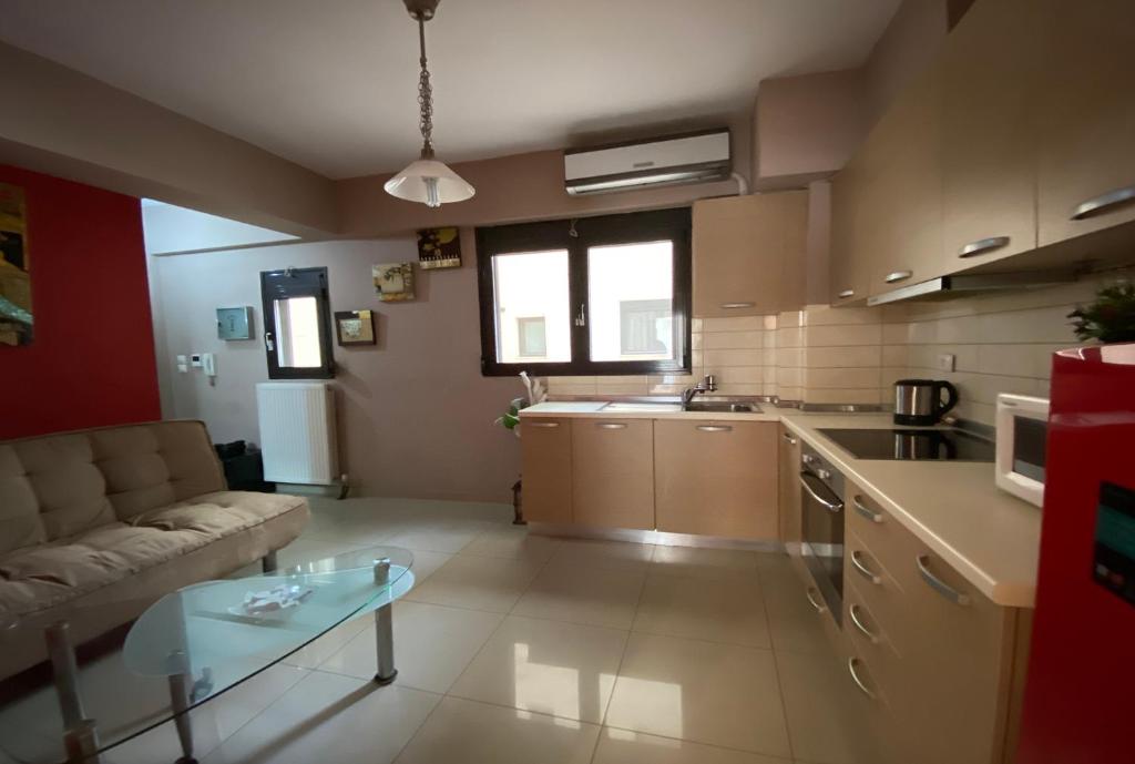 A kitchen or kitchenette at Prosilio Apartment