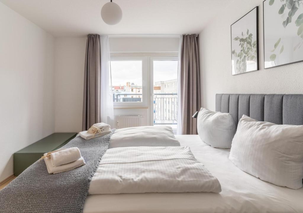 Postel nebo postele na pokoji v ubytování limehome Magdeburg Breiter Weg