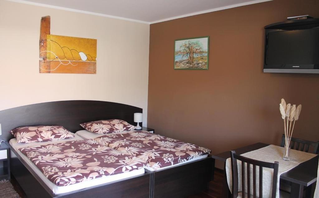 Posteľ alebo postele v izbe v ubytovaní Apartments Logos