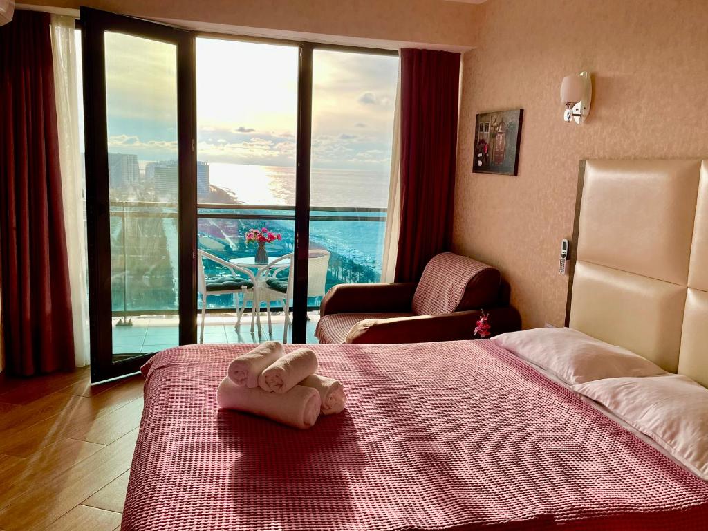 Postel nebo postele na pokoji v ubytování Sea view apartments Orbi Beach Tower