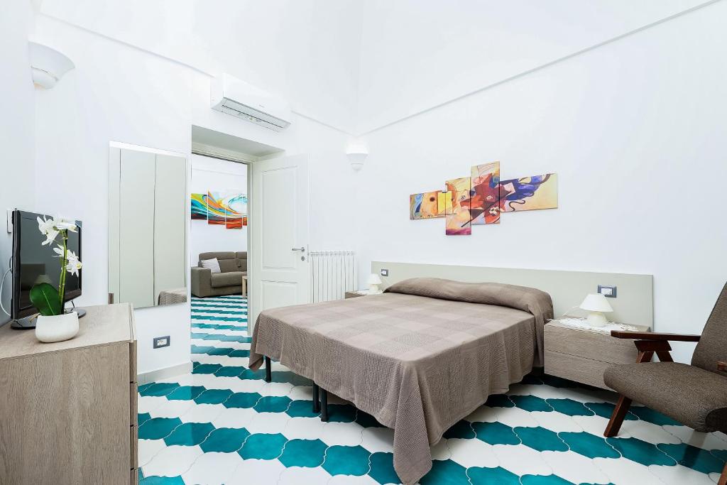 Posteľ alebo postele v izbe v ubytovaní Casa Don Plinio Amalfi Center