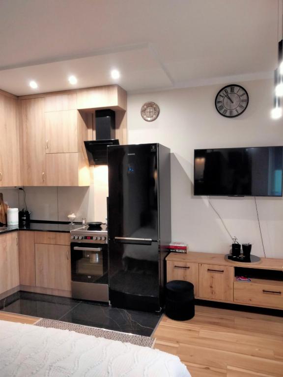 Uroczy Loft - Appartement D'une Chambre