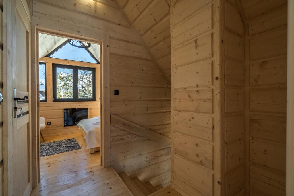 Televízia a/alebo spoločenská miestnosť v ubytovaní Domek Góralski Pod Giewontem