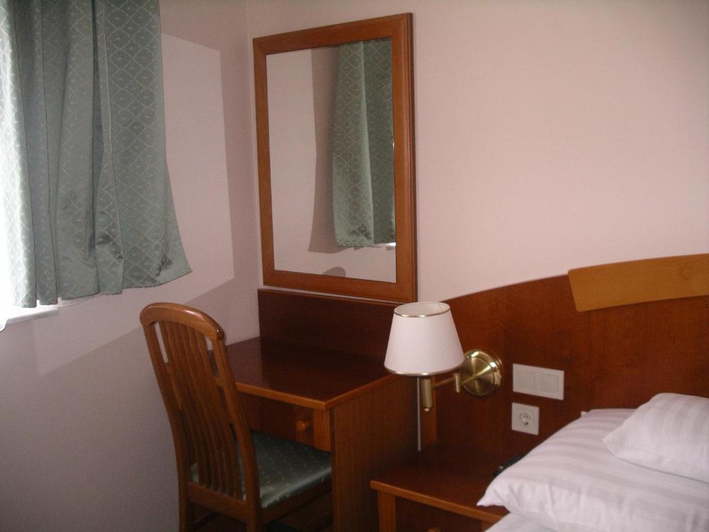 Postel nebo postele na pokoji v ubytování Palast Wellness Appartement