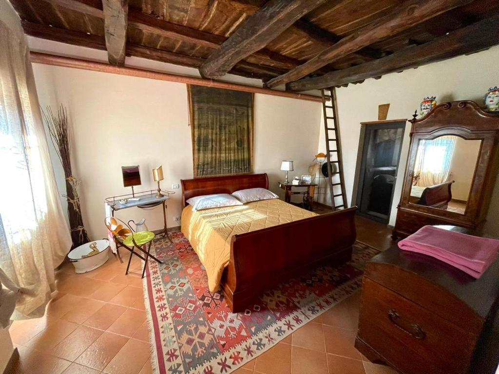 Letto o letti in una camera di Le Calanque La Terrazza su Civita