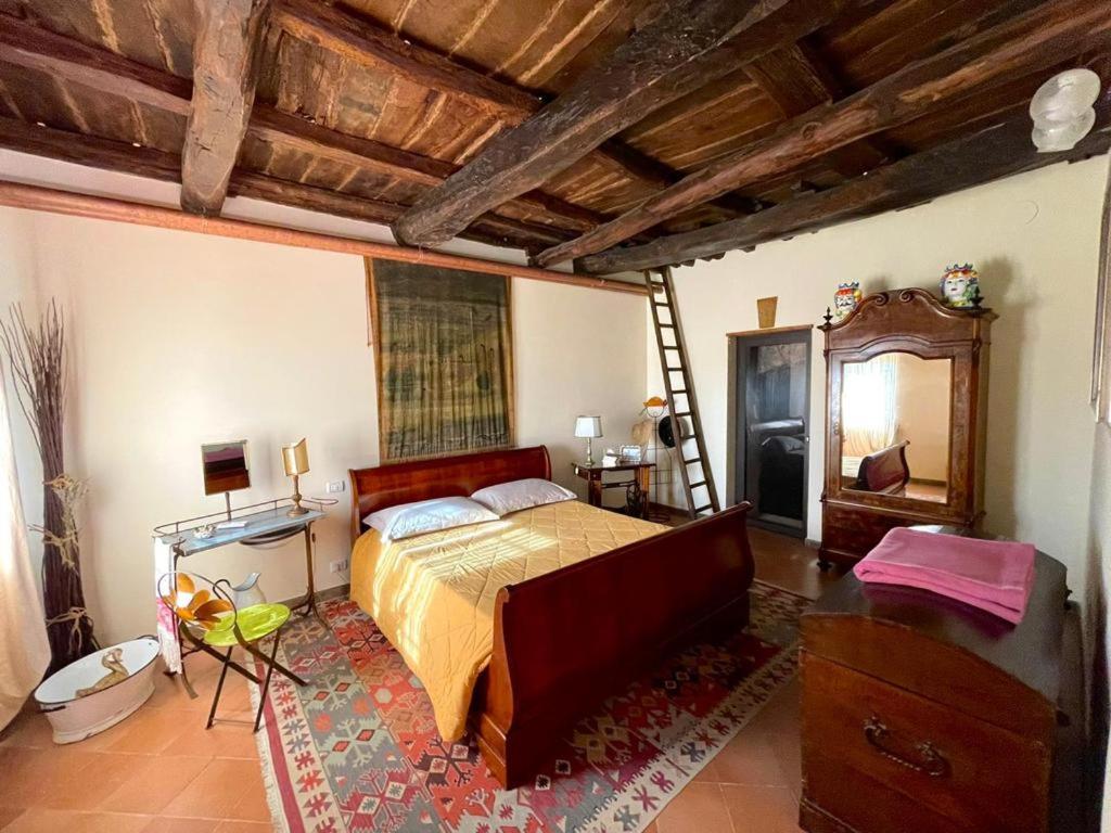 Letto o letti in una camera di Le Calanque La Terrazza su Civita