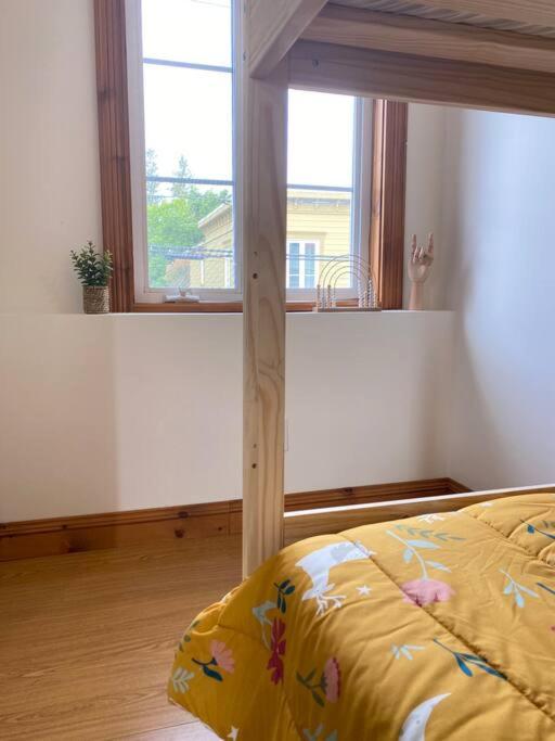 Postel nebo postele na pokoji v ubytování Maison 1900 - Confort au Vieux-Lévis