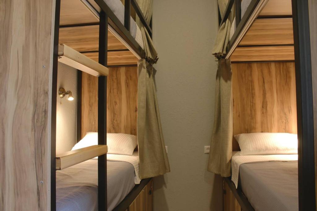 Postel nebo postele na pokoji v ubytování Hostel Nomad