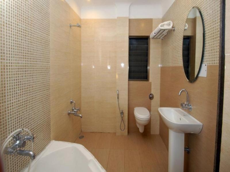 Koupelna v ubytování Sai Palace Budget Hotel