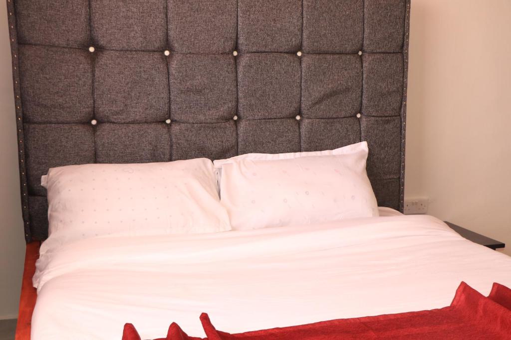 Katil atau katil-katil dalam bilik di Kirans 1 bedroom beautiful Apartment