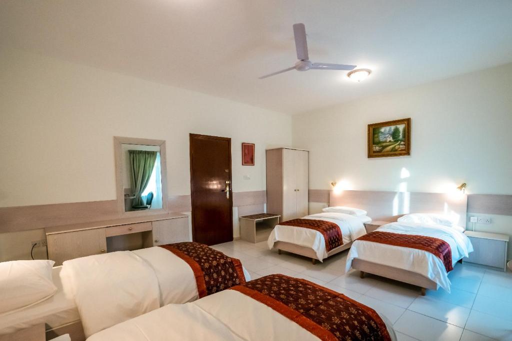 Postel nebo postele na pokoji v ubytování Hotel Summersands Al Wadi Al kabir