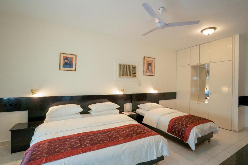 Postel nebo postele na pokoji v ubytování Hotel Summersands Al Wadi Al kabir
