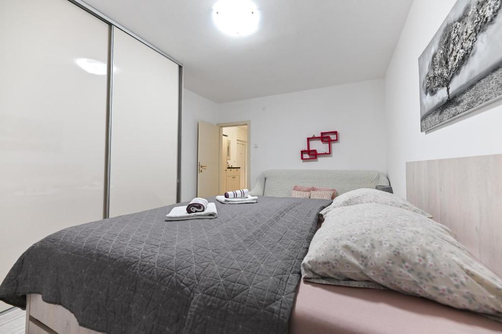 Posteľ alebo postele v izbe v ubytovaní Apartment DS