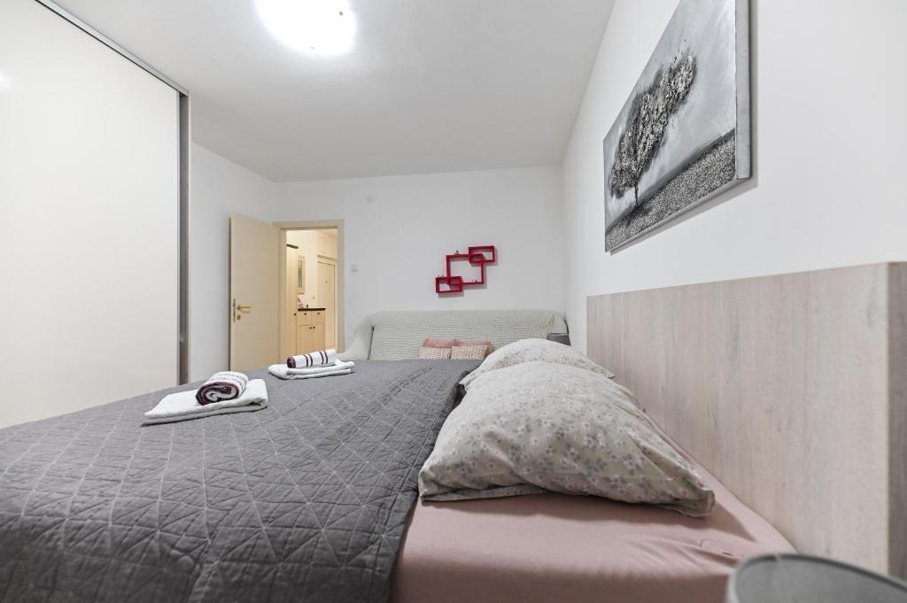 Posteľ alebo postele v izbe v ubytovaní Apartment DS