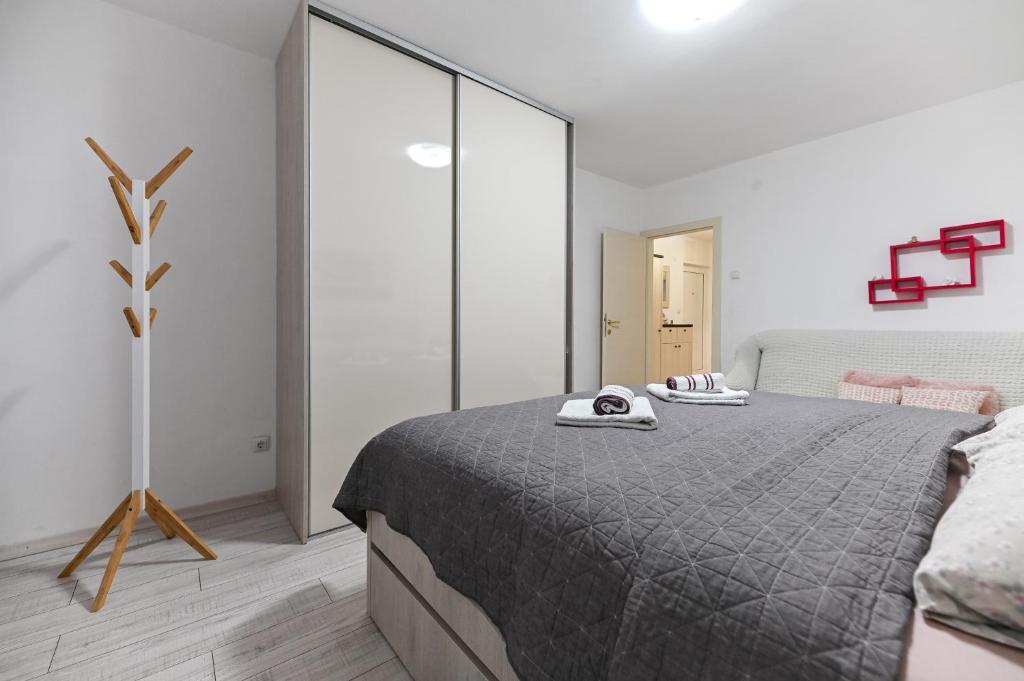 Posteľ alebo postele v izbe v ubytovaní Apartment DS
