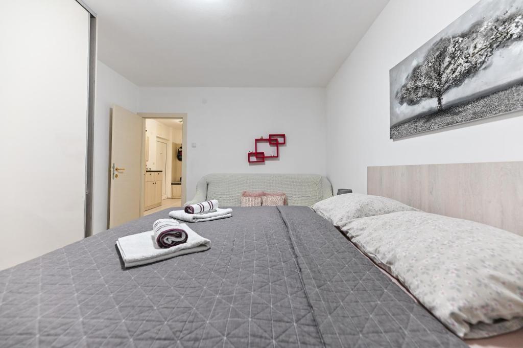 Posteľ alebo postele v izbe v ubytovaní Apartment DS