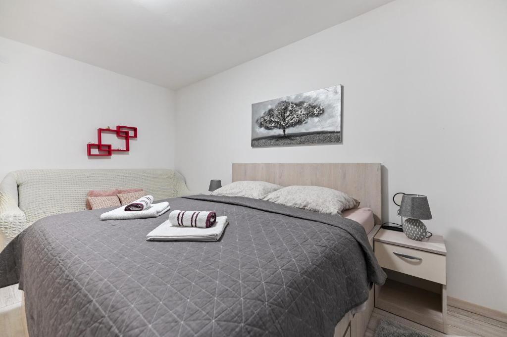 Ein Bett oder Betten in einem Zimmer der Unterkunft Apartment DS
