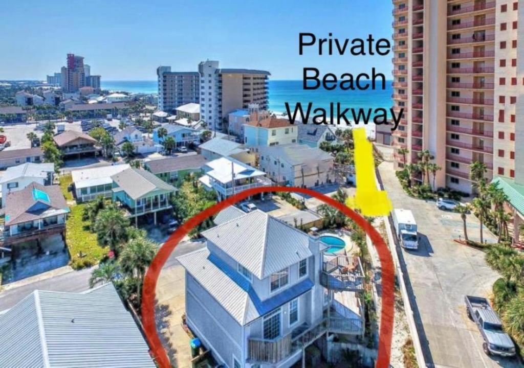 an aerial view of a house with a beach walkway at Casa Palmera in Panama City Beach