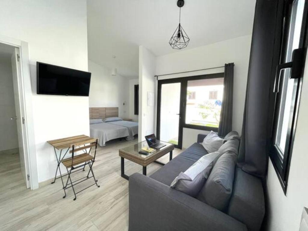 TV a/nebo společenská místnost v ubytování Bungalow Colorado with garden #4