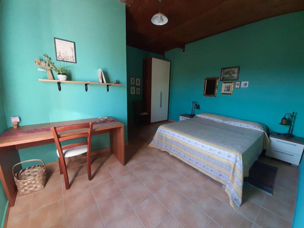 Postel nebo postele na pokoji v ubytování Tenuta Le Tre Querce