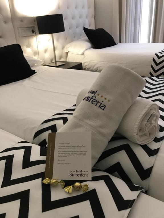 Cama o camas de una habitación en Hotel Suites Feria de Madrid