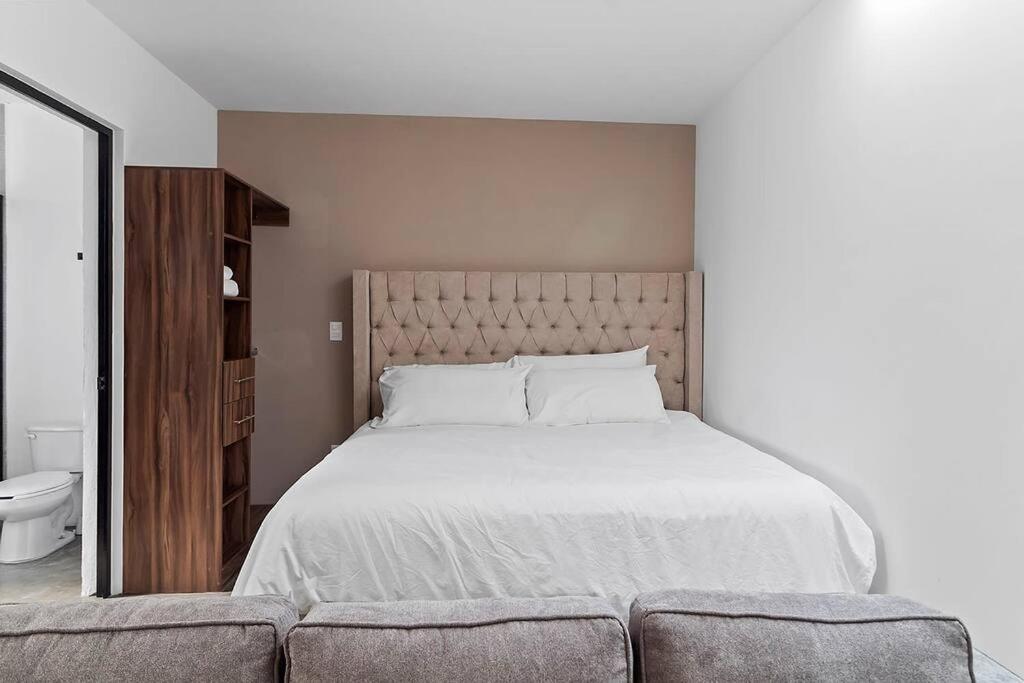 Postel nebo postele na pokoji v ubytování +MS +Loft Inmejorable +Cómodo +Internet 119F