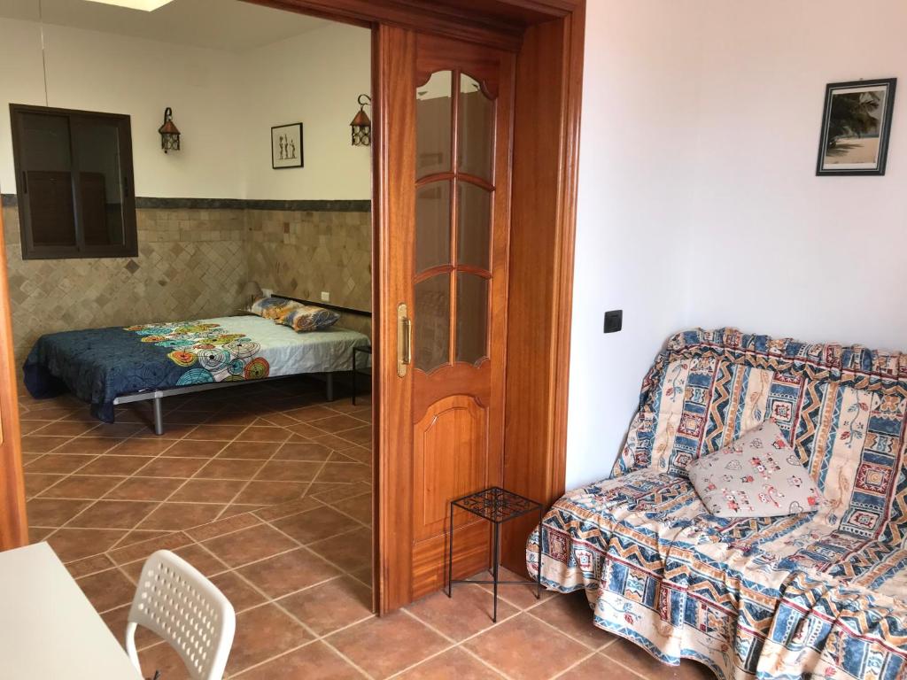 A bed or beds in a room at casaenos