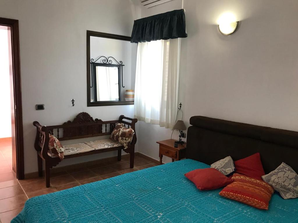 A bed or beds in a room at casaenos