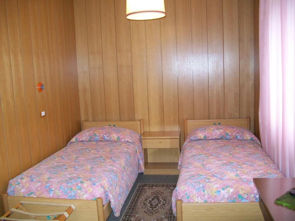 Postel nebo postele na pokoji v ubytování Albergo Bellavista