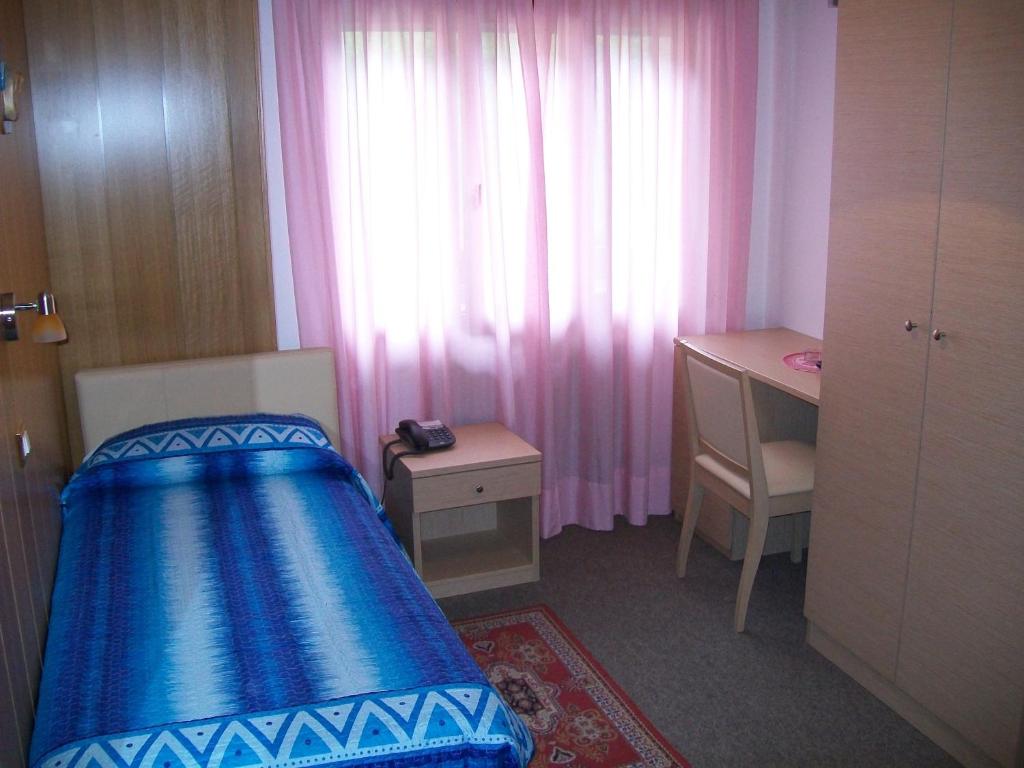 Postel nebo postele na pokoji v ubytování Albergo Bellavista