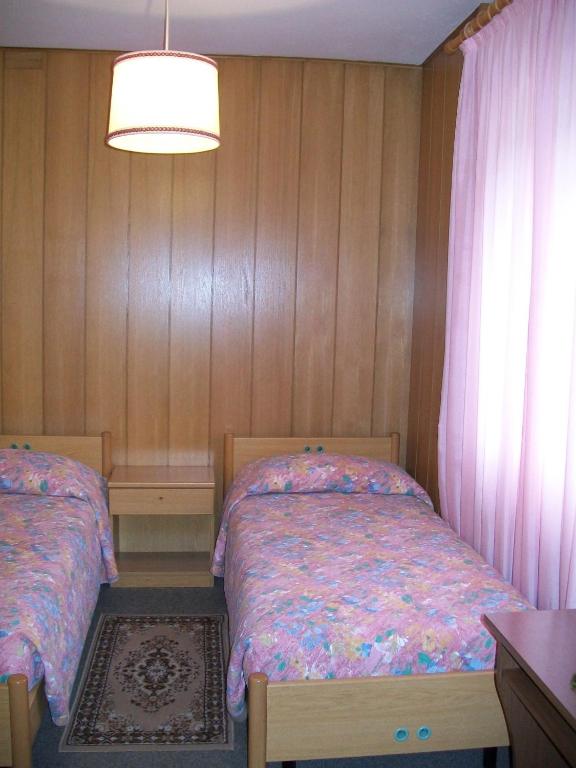 Postel nebo postele na pokoji v ubytování Albergo Bellavista